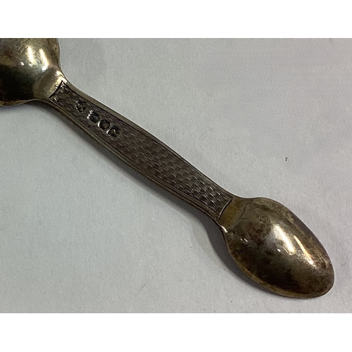 420 - A Victorian silver double-ended feeding spoon with engine turned decoration. London 1914. Approx. 34... 