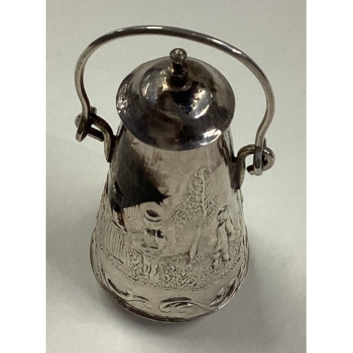 431 - A miniature Dutch silver lidded milk churn. Marked to side. Approx. 28 grams. Est. £30 - £40.