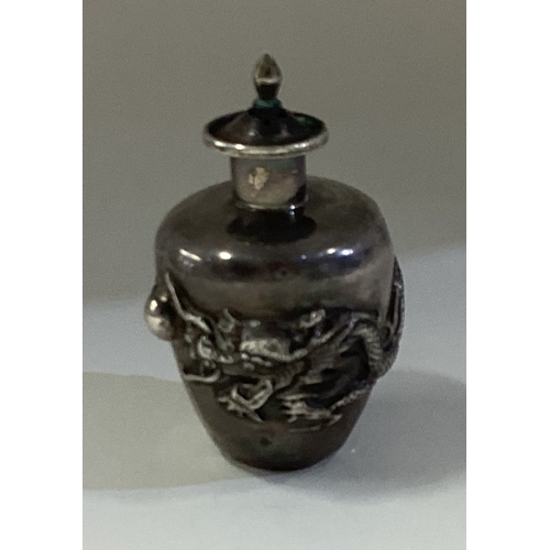 442 - A miniature Chinese silver tea caddy. Marked to base. Approx. 21 grams. Est. £40 - £60.