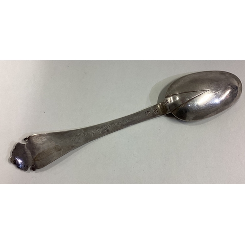 443 - A Continental silver spoon. Marked to base. Approx. 46 grams. Est. £40 - £60.