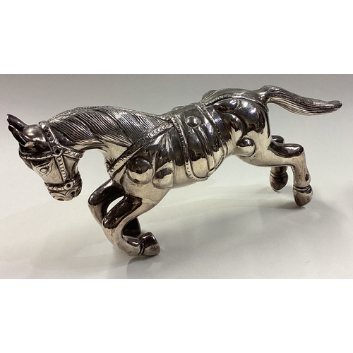 447 - A large silver figure of a horse. Approx. 227 grams. Est. £250 - £300.