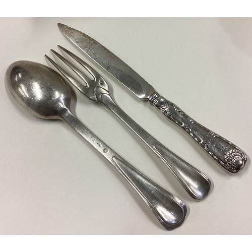 456 - An 18th Century Italian silver knife, fork and spoon set. Approx. 192 grams. Est. £200 - £300.