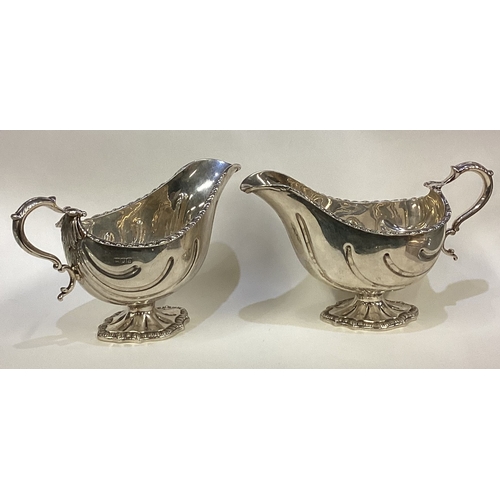 468 - A good pair of heavy silver sauceboats in the Georgian style. London. Approx. 768 grams. Est. £400 -... 