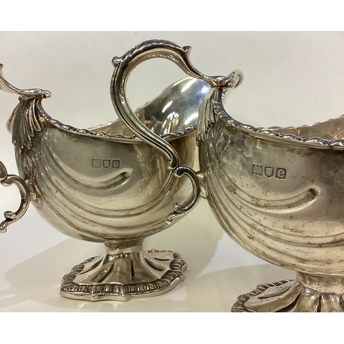 468 - A good pair of heavy silver sauceboats in the Georgian style. London. Approx. 768 grams. Est. £400 -... 