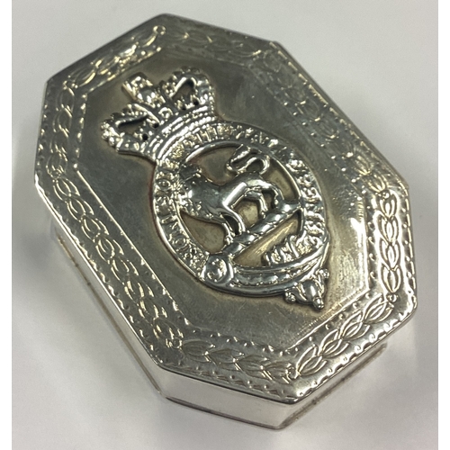 47 - A good quality shaped silver hinged top box with crown decoration. London. By CJS. Approx. 126 grams... 