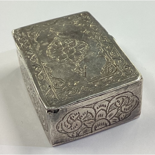 49 - An Asian silver snuff box in the form of a book with hinged cover. Approx. 33 grams. Est. £40 - £60.