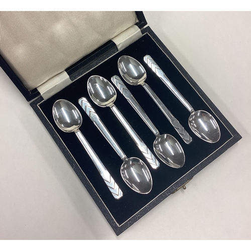 5 - R E STONE: A good boxed set of six silver spoons. Approx. 82 grams. Est. £30 - £50.