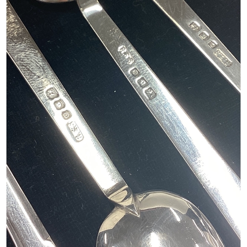 5 - R E STONE: A good boxed set of six silver spoons. Approx. 82 grams. Est. £30 - £50.