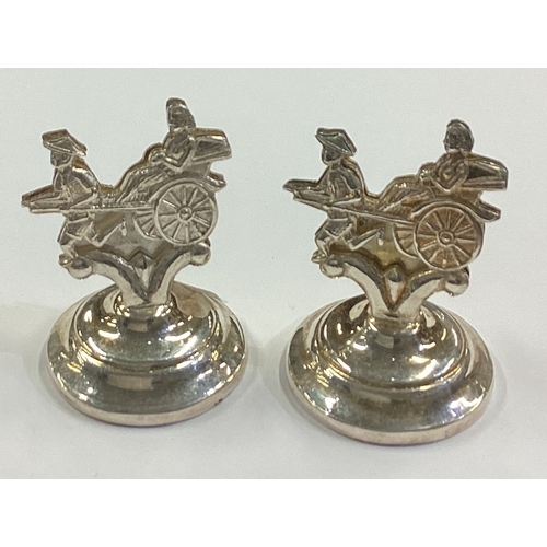 50 - A rare pair of Chinese Sterling silver menu holders in the form of rickshaws. Approx. 27 grams. Est.... 