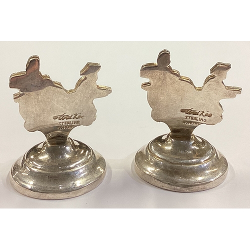 50 - A rare pair of Chinese Sterling silver menu holders in the form of rickshaws. Approx. 27 grams. Est.... 