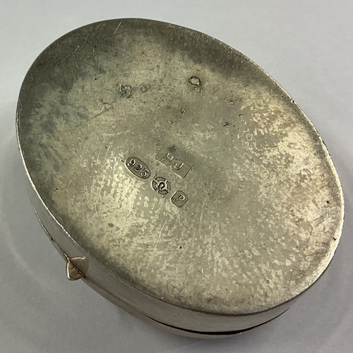 550 - An engraved silver box bearing import marks. Approx. 10 grams. Est. £15 - £20.