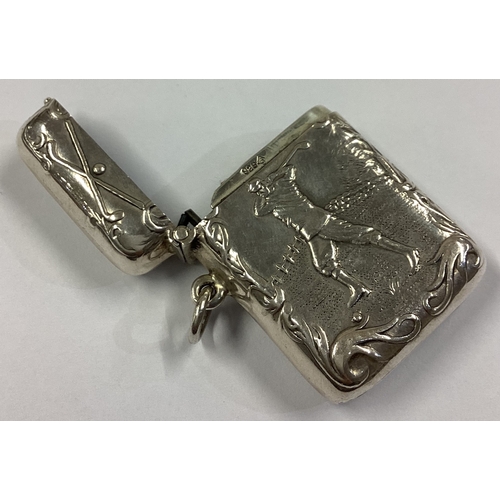 551 - A heavy chased American silver vesta case decorated with embossed golfing scene. Circa 1900. Approx.... 