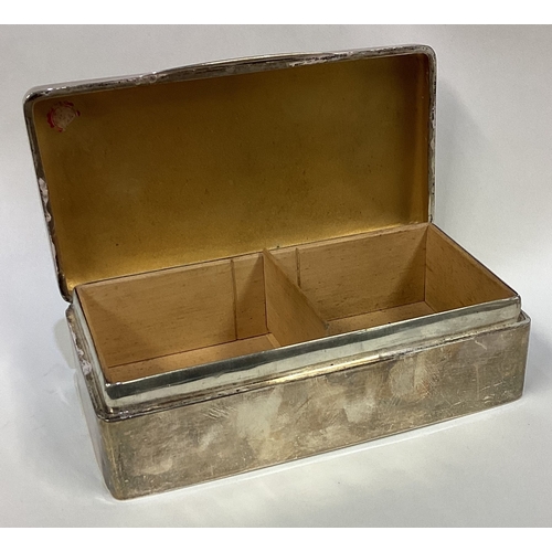 568 - A large rectangular silver hinged top cigarette box. Birmingham. By RP. Approx. Approx. 732 grams. E... 