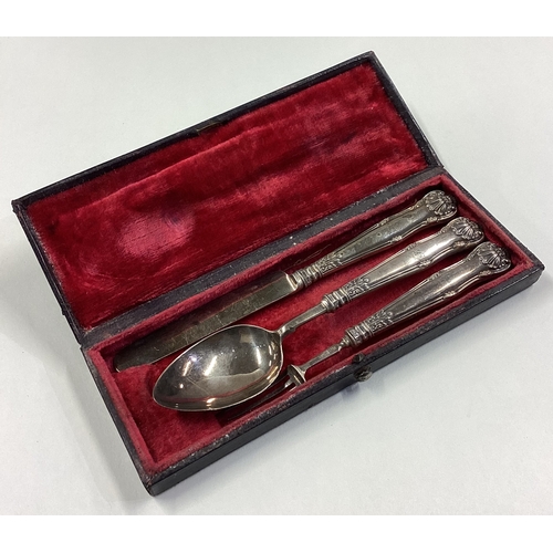 57 - A William IV silver three-piece christening set contained within fitted red case. Birmingham 1836. A... 