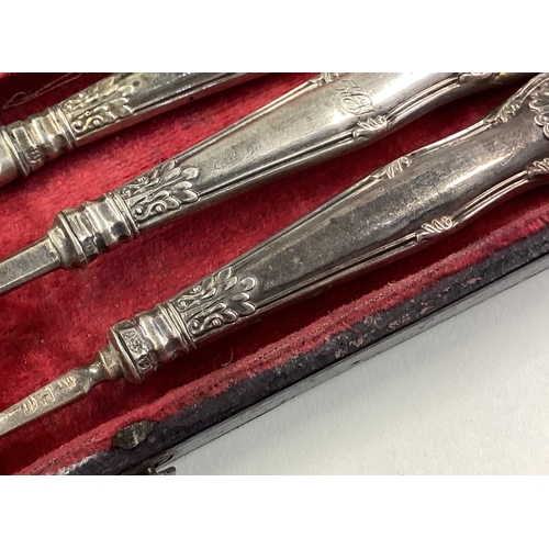 57 - A William IV silver three-piece christening set contained within fitted red case. Birmingham 1836. A... 