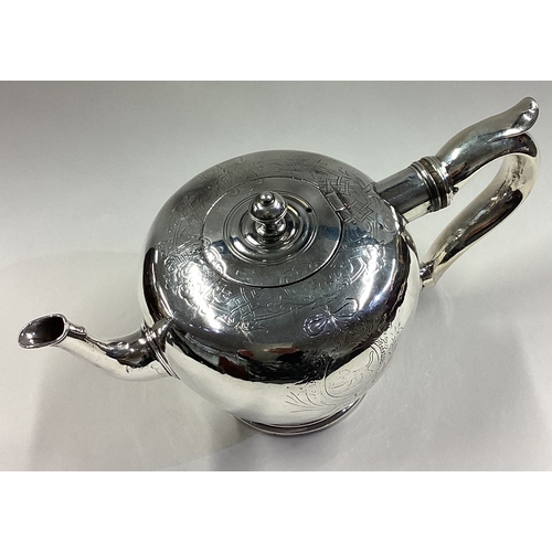 591 - NEWCASTLE: A rare silver teapot. 1732. Approx. 471 grams. Est. £2000 - £3000.