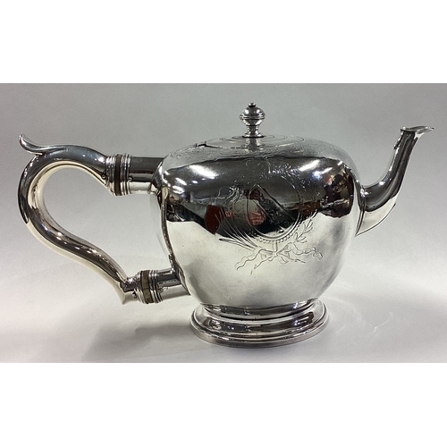 591 - NEWCASTLE: A rare silver teapot. 1732. Approx. 471 grams. Est. £2000 - £3000.