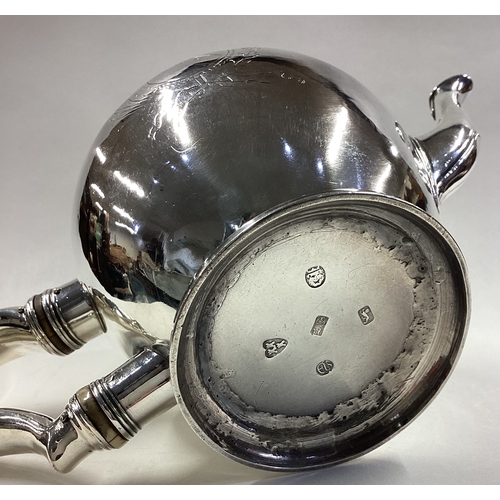 591 - NEWCASTLE: A rare silver teapot. 1732. Approx. 471 grams. Est. £2000 - £3000.