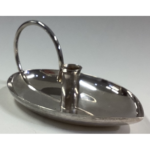 599 - A stylish silver chamberstick of leaf form. London. By GGB. Approx. 60 grams. Est. £50 - £80.