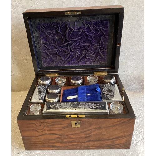 622 - A good late Victorian silver plated travelling vanity set. Est. £40 - £60.