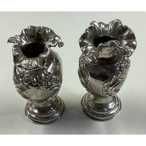 65 - CHESTER: A pair of Victorian silver vases. 1890. Approx. 282 grams. Est. £100 - £150.