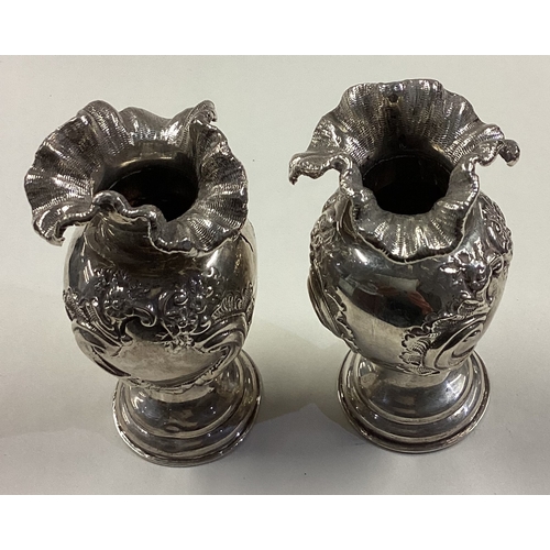 65 - CHESTER: A pair of Victorian silver vases. 1890. Approx. 282 grams. Est. £100 - £150.