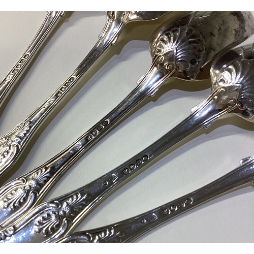 671 - A heavy set of five silver King's pattern tablespoons.  Approx. 350 grams. Est. £200 - £300.