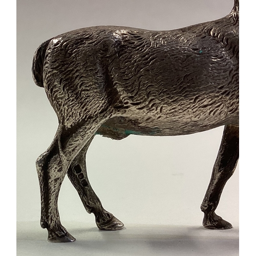 70 - A novelty silver figure of a stag. London 1995. Approx. 63 grams. Est. £200 - £300.