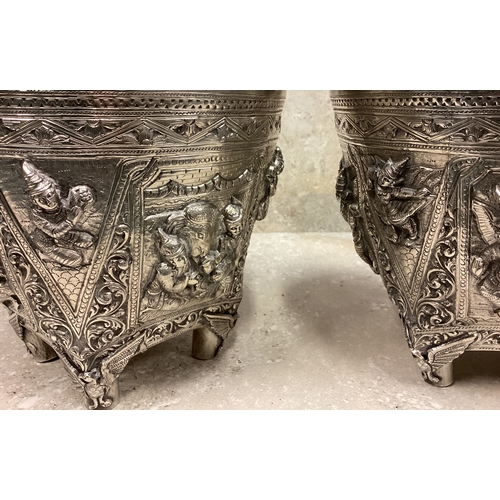 78 - A fine pair of large 19th Century Burmese silver betel boxes and covers with fine Naturalistic chase... 