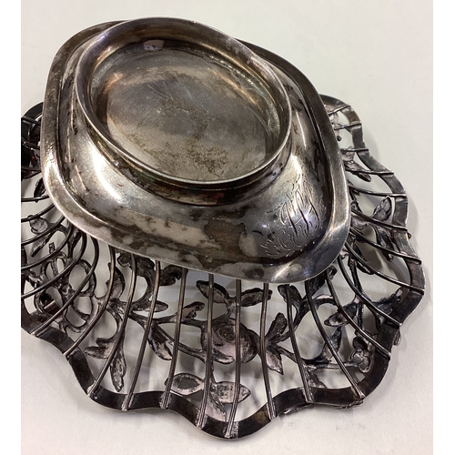 81 - An 18th Century Georgian silver basket embossed with flowers. Approx. 156 grams. Est. £200 - £300.