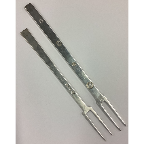 85 - Two good Modernistic silver pickle forks. Various dates and makers. Approx. 62 grams. Est. £30 - £50... 