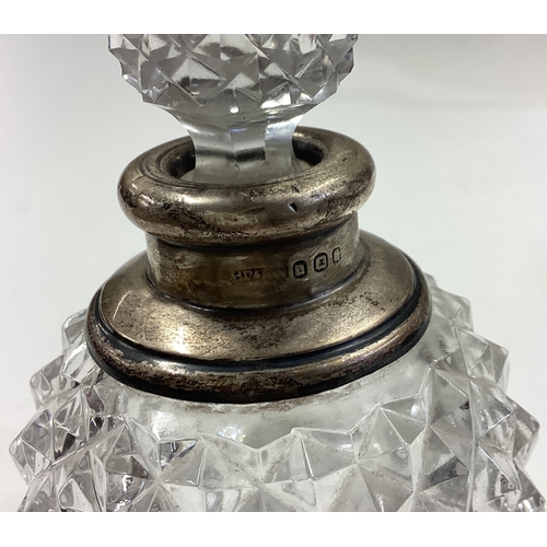 90 - A silver mounted and glass scent bottle. Birmingham. Est. £20 - £30.