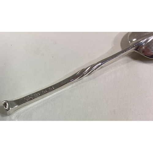 613 - OMAR RAMSDEN: A stylish silver nail top spoon with twisted stem. Approx. 14 grams. Est. £30 - £50.