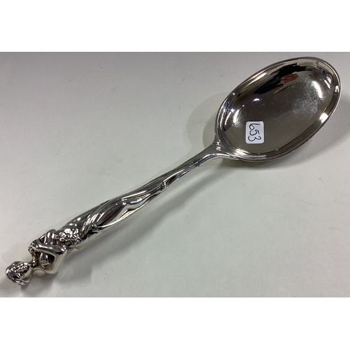 653 - A good quality cast silver spoon in the form of a stylised lady. London. Approx. 59 grams. Est. £30 ... 