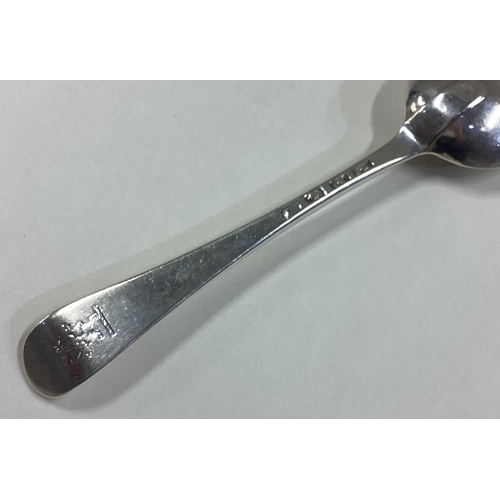 667 - A good quality silver Hanoverian pattern spoon with crested terminal. London 1765. By TJ. Approx. 60... 