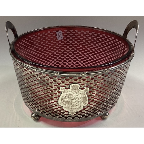 682 - A large Continental Sterling silver fruit basket with red glass liner. Approx. 199 grams of weighabl... 