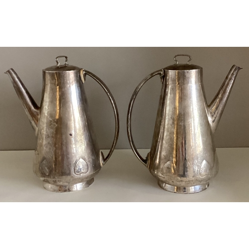 708 - LIBERTY & CO: A pair of silver water jugs. Approx. 741 grams. Est. £350 - £400.