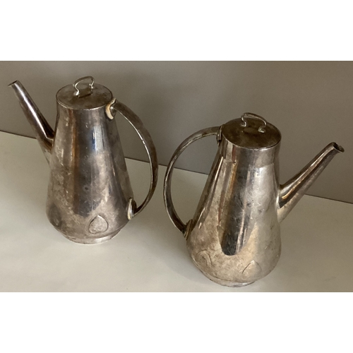 708 - LIBERTY & CO: A pair of silver water jugs. Approx. 741 grams. Est. £350 - £400.