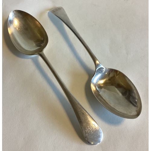 713 - A heavy pair of silver OE pattern tablespoons. Sheffield. Approx. 167 grams. Est. £30 - £50.