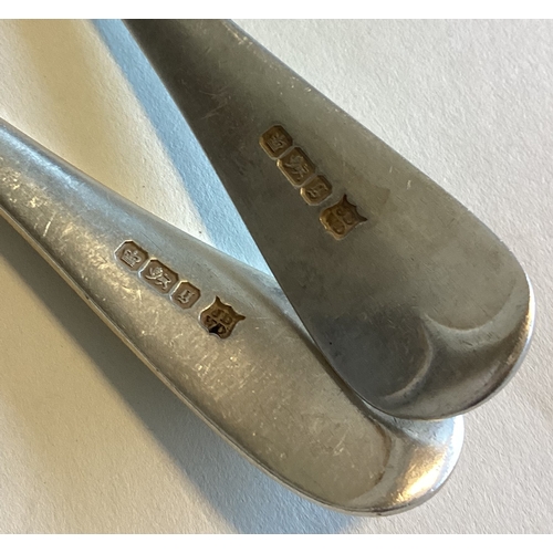 713 - A heavy pair of silver OE pattern tablespoons. Sheffield. Approx. 167 grams. Est. £30 - £50.