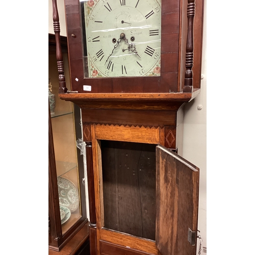 184 - An oak and mahogany grandfather clock. Est. £100 - £150.