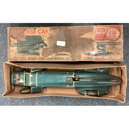 215 - An unusual boxed vintage toy model of a Bluebird land speed car. Est. £250 - £300.