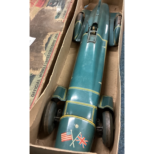 215 - An unusual boxed vintage toy model of a Bluebird land speed car. Est. £250 - £300.