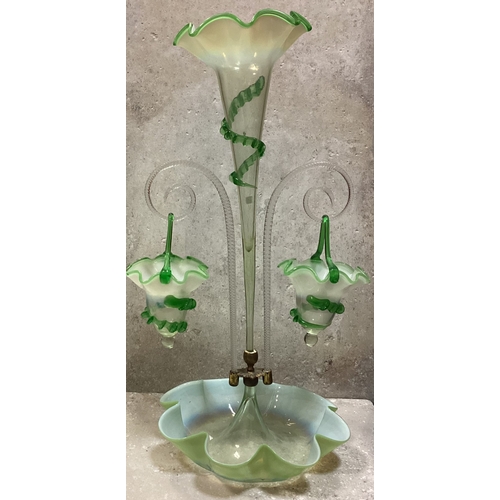 325 - A large green glass epergne with central trumpet. Est. £20 - £30.