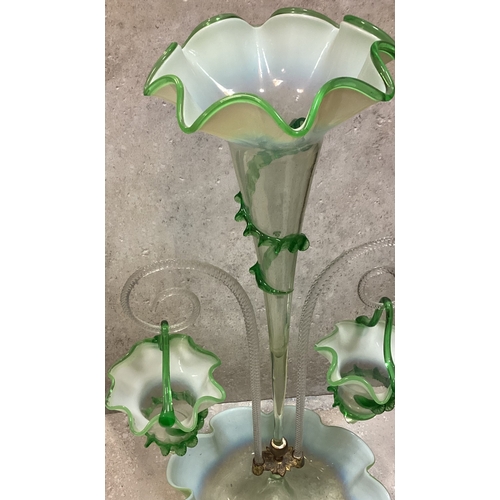 325 - A large green glass epergne with central trumpet. Est. £20 - £30.