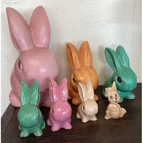 411 - A group of Sylvac and other rabbits. Est. £30 - £40.