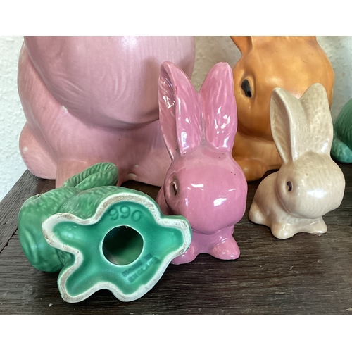 411 - A group of Sylvac and other rabbits. Est. £30 - £40.