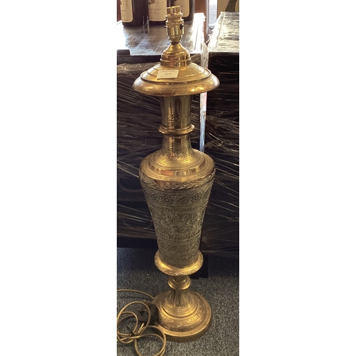 419 - A large Eastern brass lamp. Est. £20 - £30.