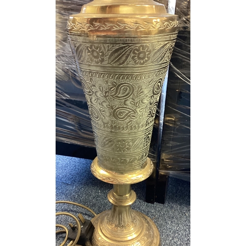 419 - A large Eastern brass lamp. Est. £20 - £30.