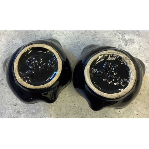 471 - A pair of Staffordshire Norcrest Redware pottery ashtrays in the form of black cat's heads. Approx. ... 